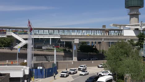 People-Walk-on-Elevated-Station-of-the-Railway-Access-to-YVR-Airport