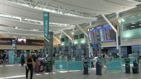 Passengers-at-Check-in-Counters-at-Vancouver-Airport-Departures-Hall