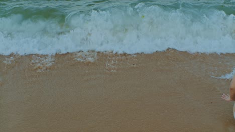 Water-waves-on-the-beach-of-seashore-sea-ocean-tide-and-sand