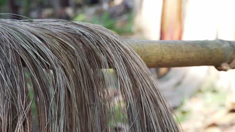 Philippine-commodity-Abaca-fibers-drying-on-bamboo-pole-on-a-sunny-day-in-the-Island-of-Catanduanes,-Bicol-Region
