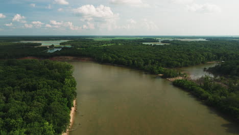 Aerial-View-Of-White-River-With-Forested-Landscape-In-Twin-City-Riverfront-Park,-De-Valls-Bluff,-Arkansas,-United-States
