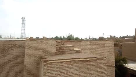 Fly-view-of-a-mosque-wall-with-christ-cross-building-architecture-design-idea-in-desert-region-in-middle-east-rural-area-village-in-Yazd-urban-brick-adobe-brown-mud-material-in-local-people-religion