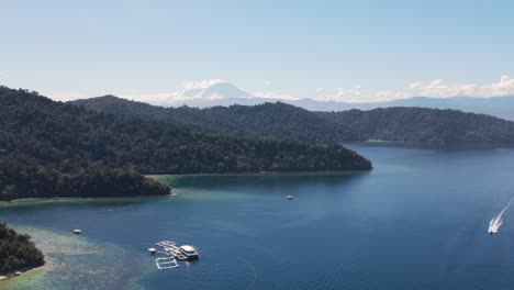 Aerial-View-Of-Gaya-Island-With-Mount-Kinabalu-In-Background