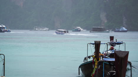 Tourist-ferries-in-the-river-in-Koh-Phi-Phi-with-rain