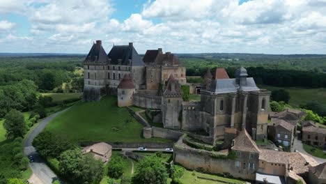 Panning-aerial-Biron-castle-Chateau-Dordogne-France
