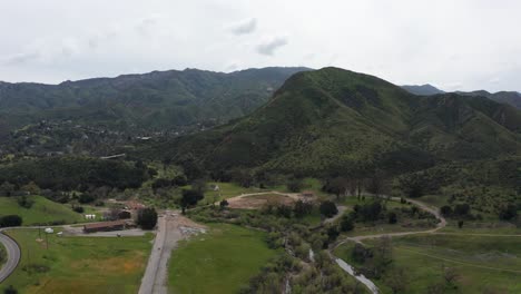 Wide-descending-aerial-shot-of-the-ruins-of-Paramount-Ranch-in-Agoura-Hills,-California-5-years-after-burning-to-the-ground