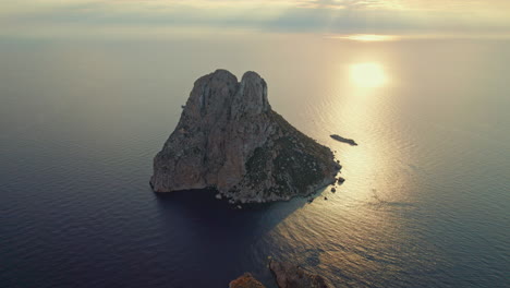Sunset-Scenery-At-Es-Vedrà-Island-In-Ibiza,-Spain---aerial-shot