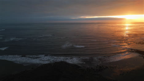 Establishing-Aerial-Drone-Shot-of-Stunning-Sunrise-at-Cleveland-Way-in-North-Yorkshire-at-Low-Tide