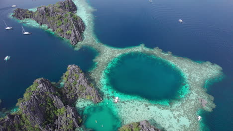 Aerial-footage-of-the-famous-Twin-Lagoon-of-Coron,-Palawan