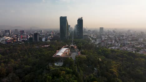 Drone-soars-over-Castillo-de-Chapultepec-with-Reforma-Skyline-on-the-background