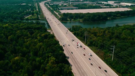 Beautiful-aerial-in-the-summer-over-Highway-Interstate-I-90-and-Fox-River