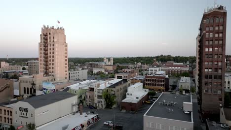 Jackson,-Michigan-downtown-skyline-at-dusk-with-drone-video-moving-sideways-right-to-left