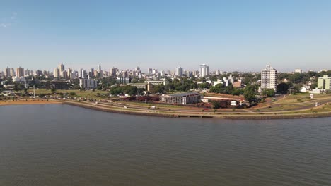 Aerial-shot-of-coastal-metropolitan-city,-city-located-near-sea