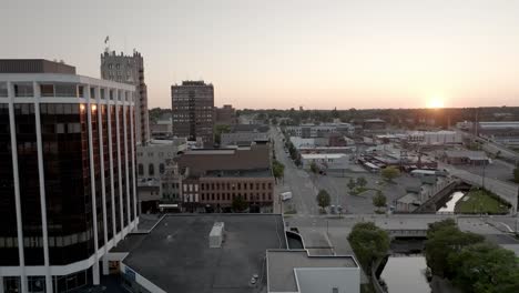 Jackson,-Michigan-downtown-skyline-at-sunset-with-drone-video-moving-in