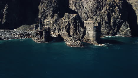 Coastline-Buildings-Drone-Shot-on-a-sunny-day-in-the-Canary-Island,-La-Gomera