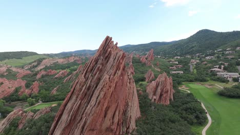 Amazing-drone-reveal-Arrowhead-village-over-natural-rock-formation