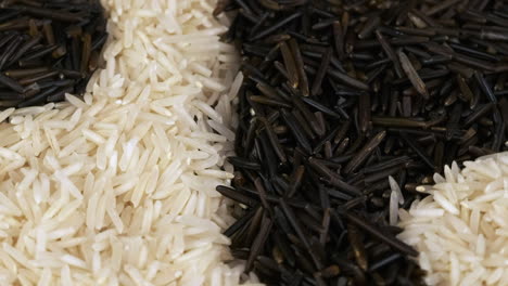 Macro-close-up:-Wild-and-white-rice-revolve-in-yin-yang-pattern-design