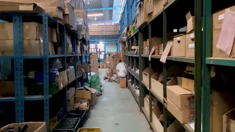 Camera-moves-forward-on-the-Corridor-warehouse-with-packages-in-logistic-room