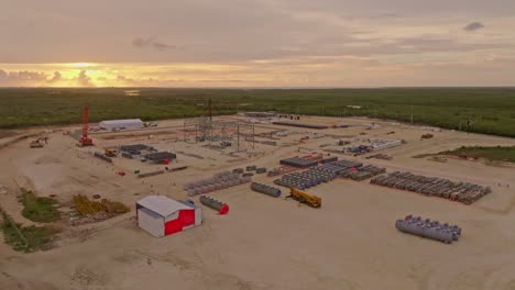 Aerial-view-showing-construction-site-of-thermoelectric-project-on-Dominican-Republic-Island-at-sunset