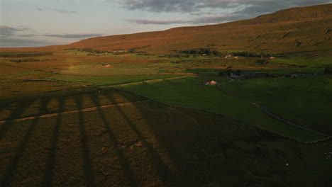 Establishing-Aerial-Drone-Shot-of-Shadows-of-Ribblehead-Viaduct-Arches-at-Golden-Hour