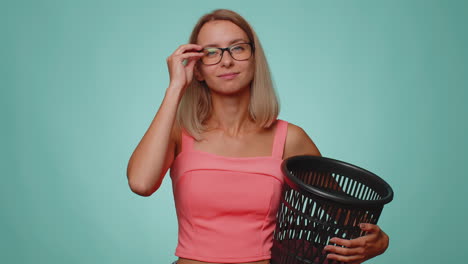 Smiling-woman-taking-off,-throwing-out-glasses-into-bin-after-vision-laser-treatment-therapy