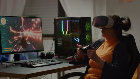 Over-shoulder-of-focused-cyber-player-wearing-virtual-reality-headset-losing-game
