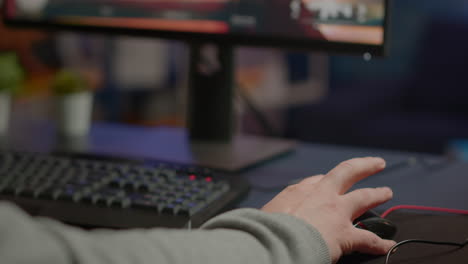 Close-up-of-man-hands-gamer-playing-video-game-using-RGB-keyboard