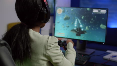 African-streamer-woman-winning-space-shooter-video-game