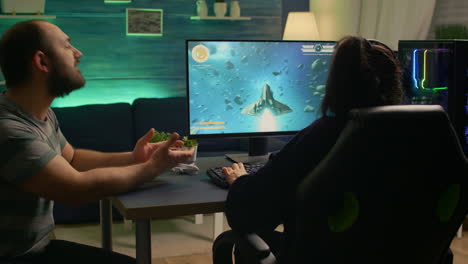 Couple-of-gamers-losing-space-shooter-tournament