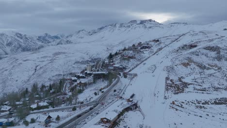 Aerial-orbiting-shot-of-the-Farellones-Ski-Resort-and-Ski-Slope-at-the-roadside