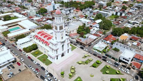 Aerial-orbiting-shot-of-Sacred-Heart-of-Jesus-Church-in-Moca,-Dominican-Republic