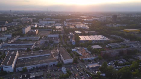 Majestic-aerial-top-view-flight-Panel-system-building,-prefabricated-housing-complex,-Berlin-Marzahn-East-Germany-golden-hour-2023