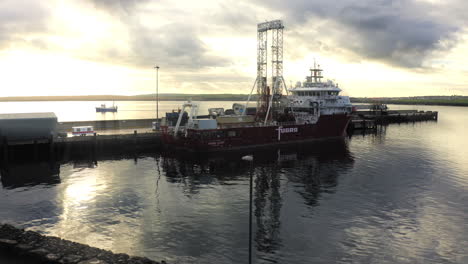 Fugro-Ferry-in-harbour-with-sunset-in-background
