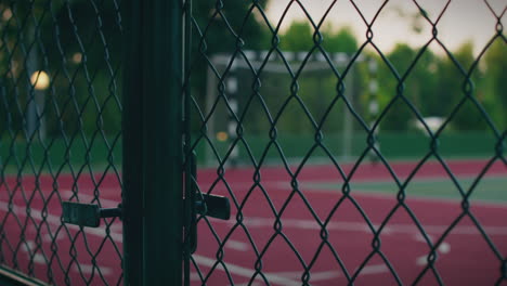 outdoor-court-fence-view-close-up-gate-shot-slow-motion
