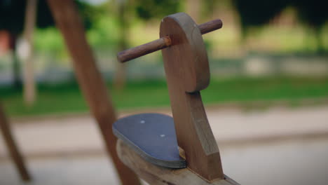 wooden-seesaw-seat-in-natural-park-close-shot