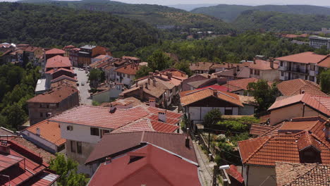 Reveal-of-distant-hills-surrounding-the-medieval-city-of-Veliko-Tarnovo-hillside