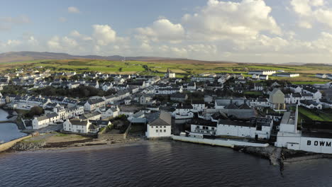 Whisky-Distillery-Aerial-Bowmore-and-Mainstreet-leading-to-rounded-Bowmore-Church