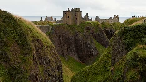 Zooming-into-Dunnottar-Castle,-Scotland,-United-Kingdom