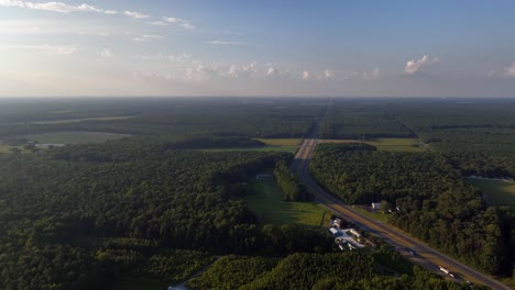 An-aerial-view,-high-up-over-farmlands-in-Delaware-on-a-sunny-day