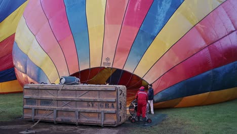 Hot-air-balloon-setup-on-adventure-holiday-tourism-safari-tour,-African-Wildlife-in-Maasai-Mara-National-Reserve,-Kenya,-Africa-Safari-Animals-in-Masai-Mara-North-Conservancy