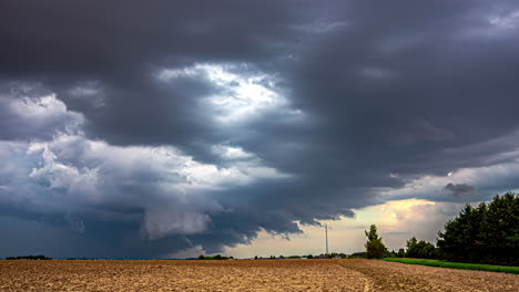 Latvia's-Farmland-Landscape-Amidst-Stormy-Skies-and-Ominous-Cumulonimbus-Clouds
