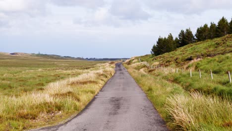 Shot-of-a-single-track-road-on-the-moorland-of-the-Isle-of-Lewis