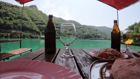 Eating-in-a-fantasy-place-in-jablanica-lake,-Bosnia-and-Herzegovina