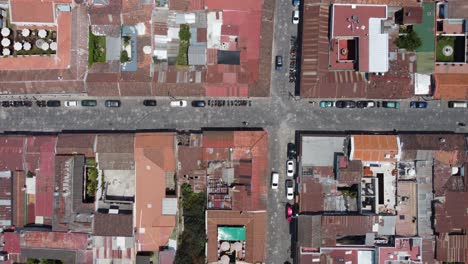 Aerial-looks-directly-down-on-narrow-cobble-streets-of-Guatemalan-city
