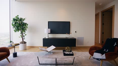 Wide-shot-of-a-modern-living-room-with-a-blank-television