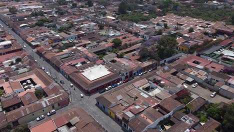 Aerial-view:-Charming-old-town-cobbled-streets-of-Antigua,-Guatemala