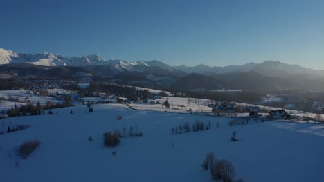 Snowy-Peaks-and-Village-Streets:-Aerial-Exploration-of-Polish-Tatras-mountains-in-Winter