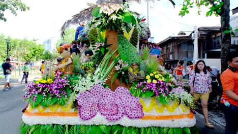 A-well-decorated-with-flowers-and-vegetable-vehicles-with-a-statue-of-a-Philippine-Eagle-on-the-very-top