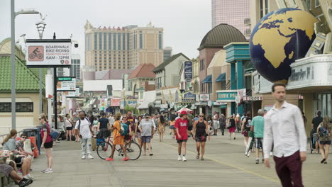 People-Enjoy-Summer-Morning-on-Atlantic-City,-New-Jersey-Boardwalk