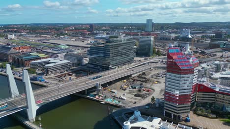 Aerial-over-the-newly-built-Hisingsbron-Bridge-over-Gota-Alv-River-In-Gothenburg-City,-Sweden